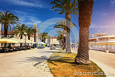 Historic buildings on promenade in Trogir, Croatia. Trogir is popular travel destination in Croatia. Trogir, as a UNESCO World Stock Photo