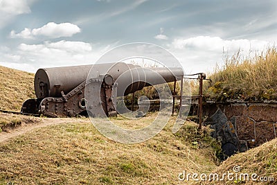 Historic canon at Suomenlinna island, a sea fortress southeast of Helsinki, Finland Stock Photo