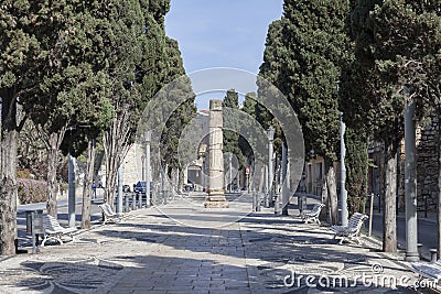 Historic center, promenade with roman column in Tarragona,Spain. Editorial Stock Photo