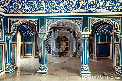 City Palace Jaipur interior hall with medieval architecture with beautiful wall artwork at Rajasthan, India Stock Photo