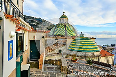 Historic colorful domes of a church in Maiori on the Amalfi coast in Italy Stock Photo
