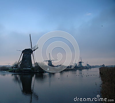 Historic dutch windmills in winter Stock Photo