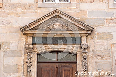 Historic entrance portal made of sandstone in the old town of Bayreuth Editorial Stock Photo