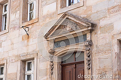 Historic entrance portal made of sandstone in the old town of Bayreuth Editorial Stock Photo