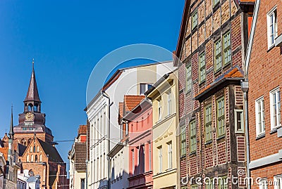 Historic facades and church tower in Gustrow Stock Photo