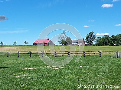 Historic Farmhouse and Barn Stock Photo