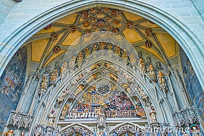 Historic figures of the entrance portal of Bern Minster, Switzerland Editorial Stock Photo