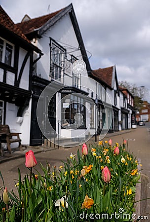 Historic half timbered building in High Street, Pinner Village, Middlesex UK, once village bakery, now Pizza Express restaurant Stock Photo