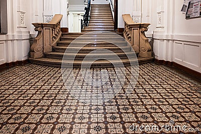 Historic hallway with ancient tiles at an old tenament house in Chwallagasse 2 Editorial Stock Photo