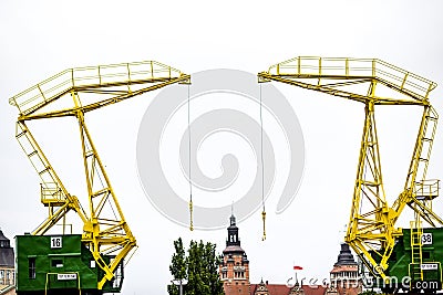 Historic harbor cranes for the buildings of Szczecin Stock Photo