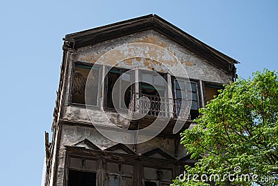 Historic house, wooden facade of a building ruin in old town of Damascus Stock Photo