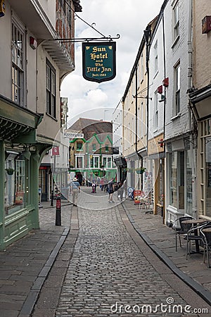 Historic houses with people downtown medieval Canterbury city, E Editorial Stock Photo