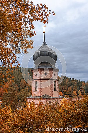 Maria in der Tanne church in Triberg, Germany surrounded with fall foliage Stock Photo