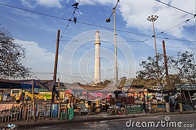 Historic Ochterlony Monument or Shaheed Minar a notable landmark as seen from a street in Kolkata near Chowringhee. Editorial Stock Photo