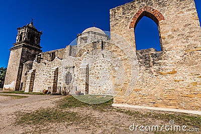 The Historic Old West Spanish Mission San Jose, Founded in 1720, San Antonio, Texas, USA. Showing dome, bell tower, and one of t Stock Photo