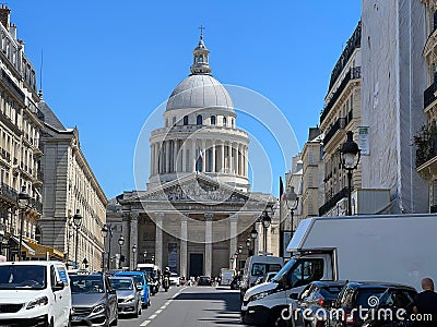 Historic Pantheon building with many cars parked nearby in Paris, France Editorial Stock Photo