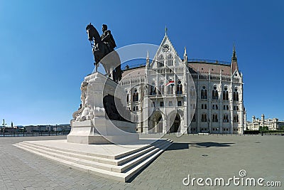 Historic parliament building with statue of Gyul AndrÃ¡ssa in Budapest Stock Photo