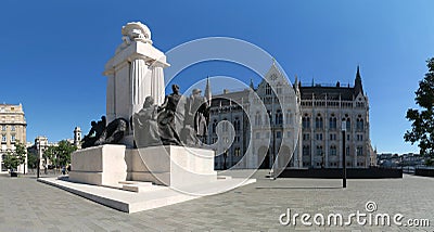 historic parliament building with statue of IstvÃ¡n Tisza in Budapest Stock Photo