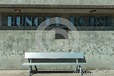 Historic Plaque and Bench at the Gatehouse at the Hungry Horse Dam, Montana, USA Editorial Stock Photo