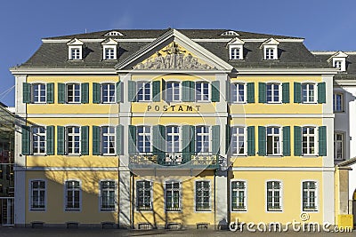 Historic post office at Munster square in Bonn with inscription Postamt post office at facade Stock Photo