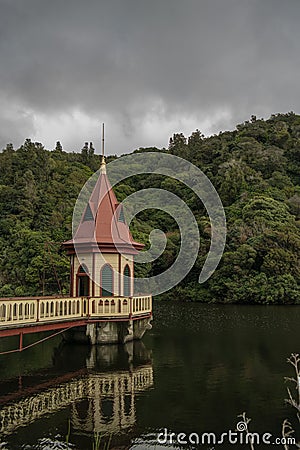 Historic pumphouse in the middle of a dam in Wellington Stock Photo