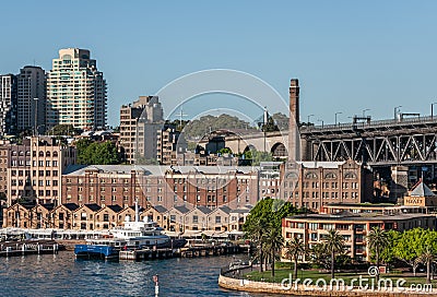 Historic Rocks warehouse and Harbour Bridge on-ramp, Sydney, Australia Editorial Stock Photo