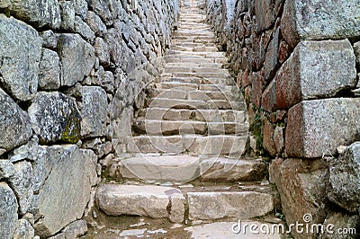 Historic Stone Staircase in the Machu Picchu Inca Citadel, Archaeological site in Urubamba Province, Cusco Region, Peru Stock Photo