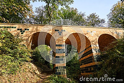 Historic Stone viaduct in the park Muskauer Stock Photo