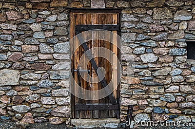 Historic stone wall and door Stock Photo