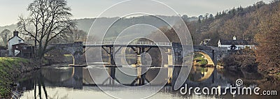 Historic Toll Bridge Spanning River Wye in UK Stock Photo