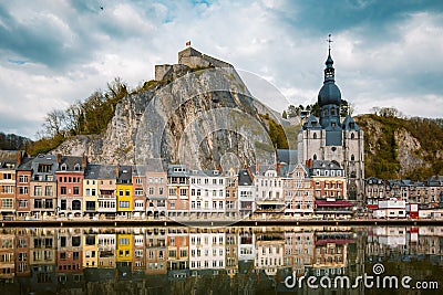 Historic town of Dinant with river Meuse at sunset, Wallonia, Belgium Stock Photo