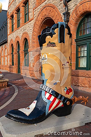 Historic Union Pacific Railroad train depot, a historic landmark, and it statue and boot adornments in Cheyenne, Wyoming Editorial Stock Photo