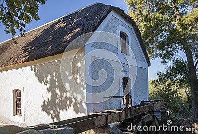 Historic water mill in mission village of Elim Stock Photo