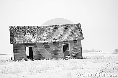 Abondoned farm buildings on a frosty morning. Alberta,Canada Stock Photo