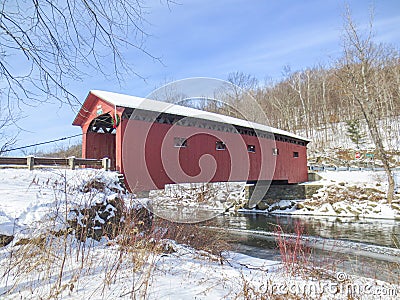 Historic West Arlington Covered Bridge in the winter in Vermont Stock Photo