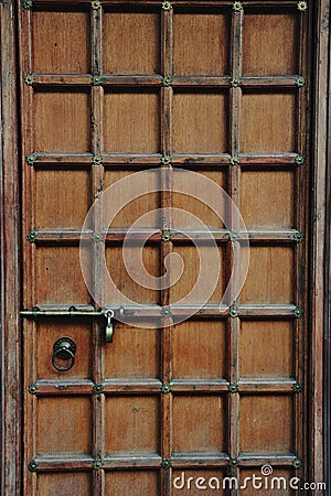 A historic wood door with pattern in jodhpur fort Stock Photo