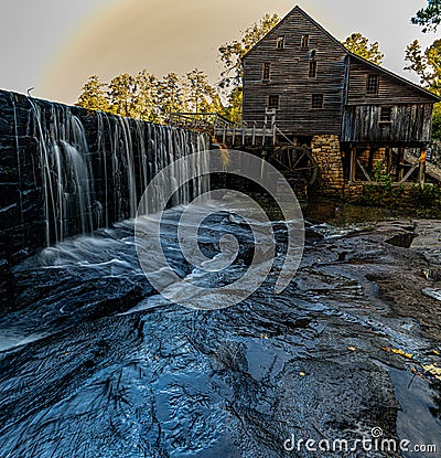 Historic Yates Grist Mill and Dam Stock Photo