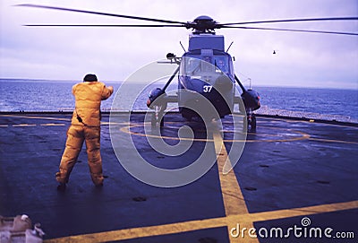 3 ara, aircraft carrier 25 de mayo, argentine navy, year 1982 malvinas war, falkslands, helicopter landing with soldiers Editorial Stock Photo