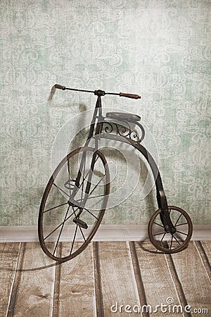 Historical bicycle by the wall Stock Photo