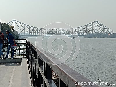The historical bridge called Howrah bridge situated in India developed by East India company when they ruled in India Editorial Stock Photo