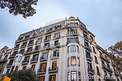 Historical building on Rambla street cityscape image. Bottom street view at sunset time in Barcelona Editorial Stock Photo