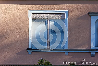 historical city facades with windows balcony doors Stock Photo