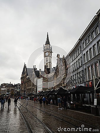 Historical clock tower former post office building facade at Korenmarkt wheat market Ghent East Flanders Flemish Belgium Editorial Stock Photo