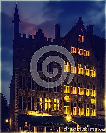 Historical houses at Market Square of Bruges, Belgium at night Editorial Stock Photo