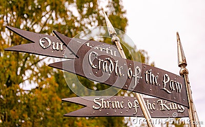 Historical medieval sign in a park in Bury St Edmunds Stock Photo