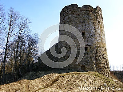 Historical monument. View of the stone walls and towers of the ancient fortress of Koporye. Russia. Stock Photo