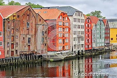 Historical Old Timber Buildings and the river Nidelva in Trondheim. Stock Photo