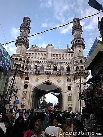 A historical palace of India with a lots of people called Chaar Minar Editorial Stock Photo