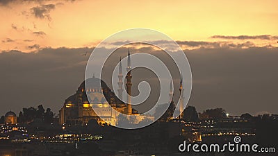 Night view to lighting Suleymaniye Mosque on a background of nigtfall sky, Istanbul Turkey. 4K UHD video, 3840, 2160p. Stock Photo