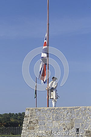 Historical reenactment of raising of flag at Fort Ticonderoga, site of French and Indian Wars, Lake Champlain, NY Editorial Stock Photo